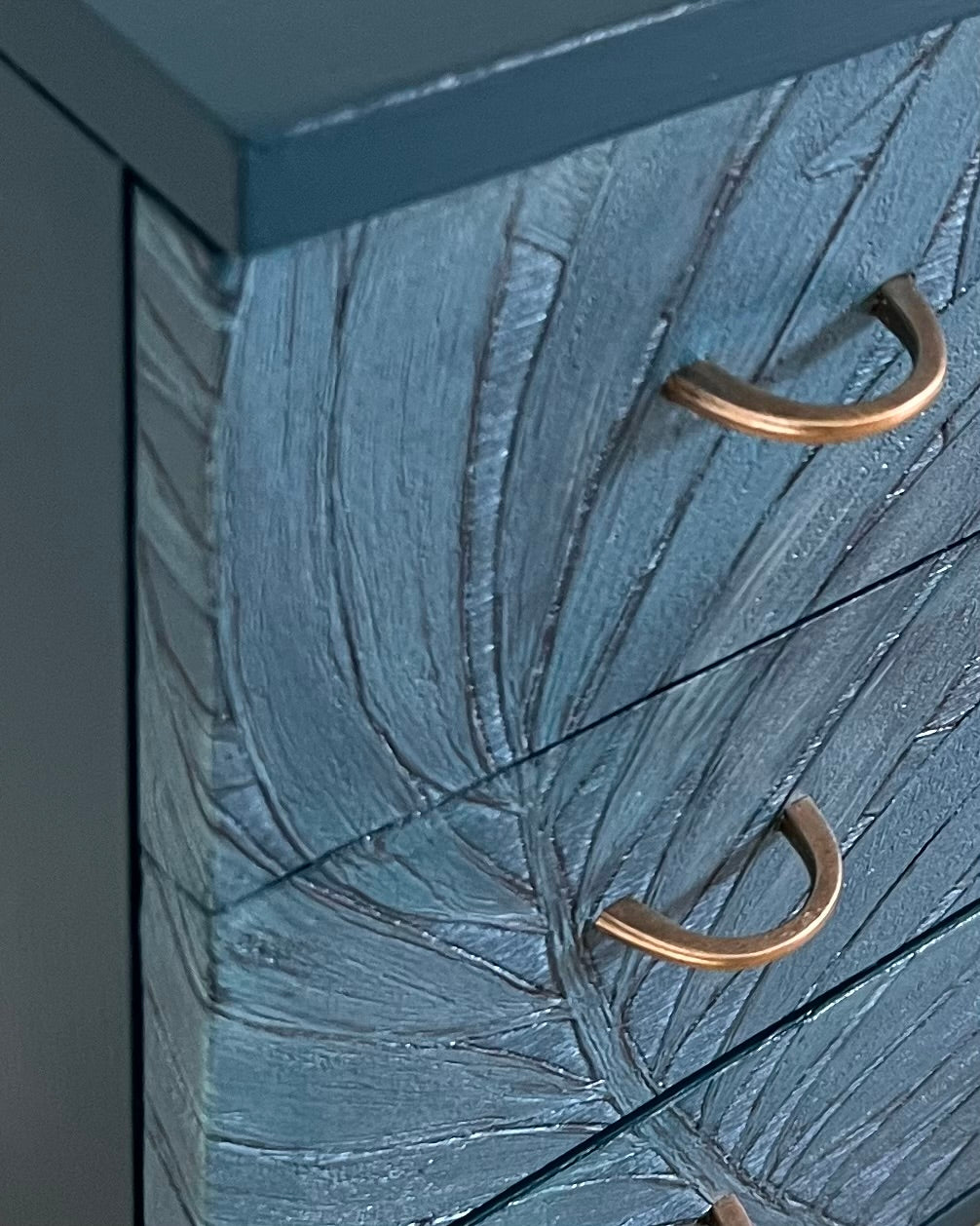 Vintage cabinet covered with the graceful leaves of the Sabal palm in relief | The Vintage Vibe