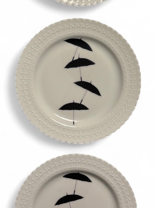 Vintage Wandbord Set man met paraplu’s