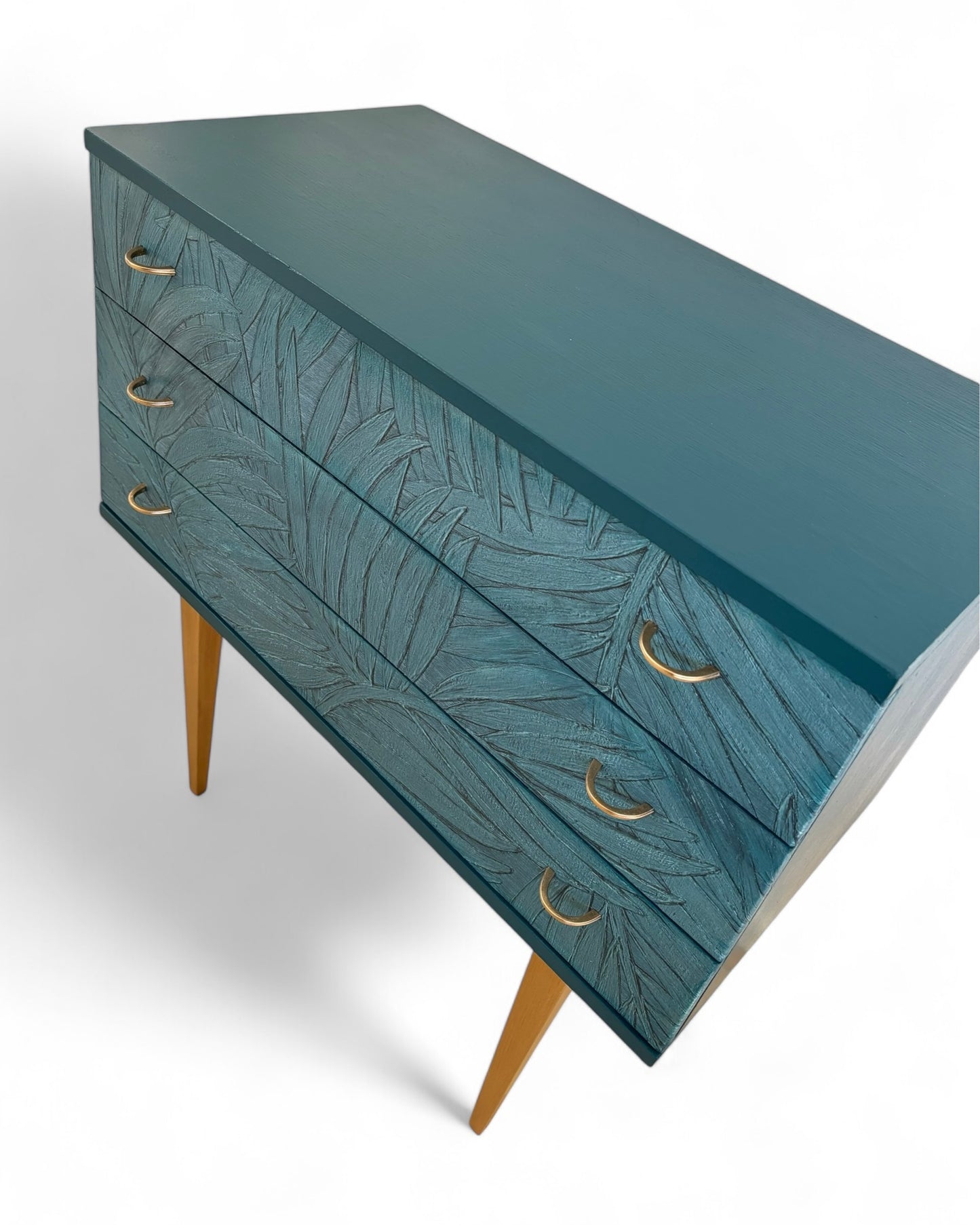 Vintage cabinet covered with the graceful leaves of the Sabal palm in relief | The Vintage Vibe