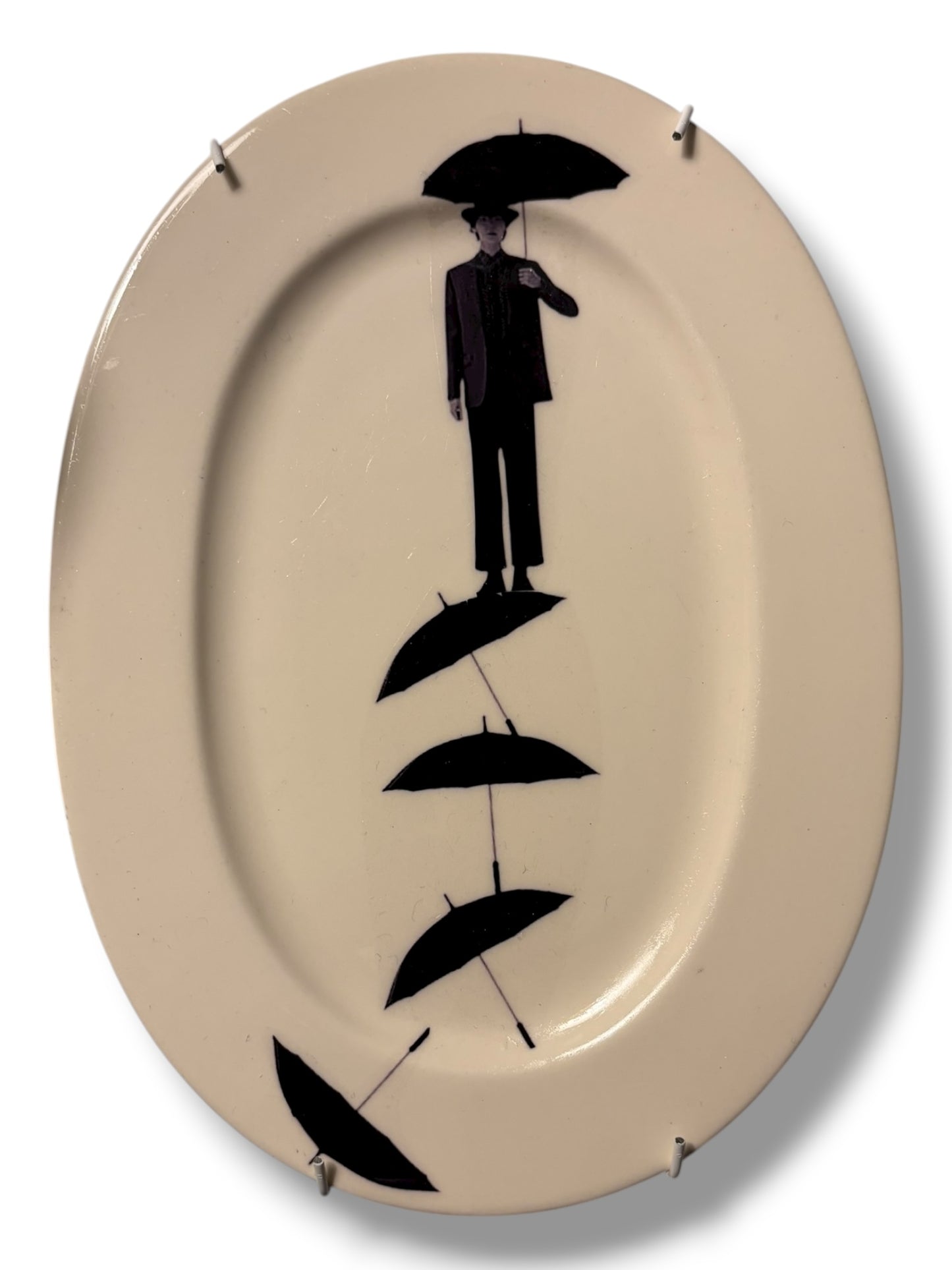 Vintage Wandbord Ovaal Man op Paraplu