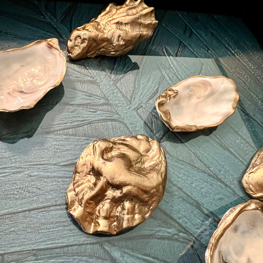Golden oysters in black frame | The Vintage Vibe