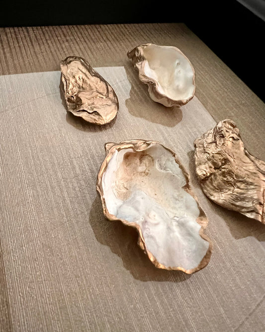 Golden oysters in black frame | The Vintage Vibe